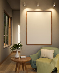 Empty frame with spotlight on wall over green sofa chair and side table in a gallery or exhibition.