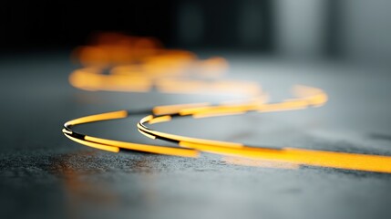 Bright Orange Light Trail on Dark Surface with Soft Focus Effect
