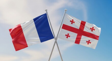 France and georgia flags waving against blue sky