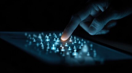 A finger interacts with a digital touchscreen displaying a glowing network of connected people icons in a dark environment