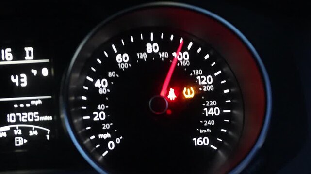 A shaky first person video of a car's speedometer gauge at high speeds of over 90 miles per hour.