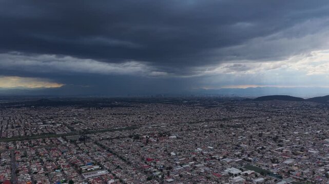 Drone footage of intense rainfall in Ecatepec Mexico during afternoon