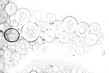 Oil with bubbles abstract background. Soft selective focus.