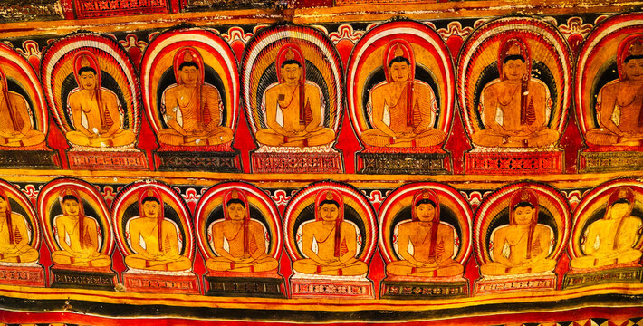 Close up of the 1000 Buddha murals inside Cave 3, the Maha Alut Viharaya at the Dambulla Cave temples built 1st centure BCE by King Valagamba and Lankan kings in Dambulla,Sri Lanka