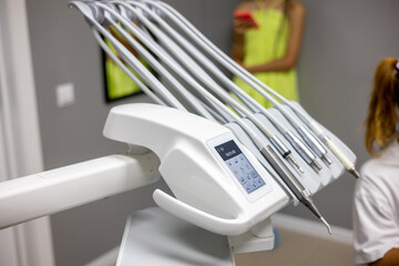 Advanced dental tools await patient care in a modern clinic during a bright afternoon