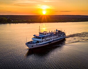 Obraz premium River cruise ship at sunset