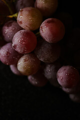 Fresh red grapes close up, organic fruit, juicy healthy food