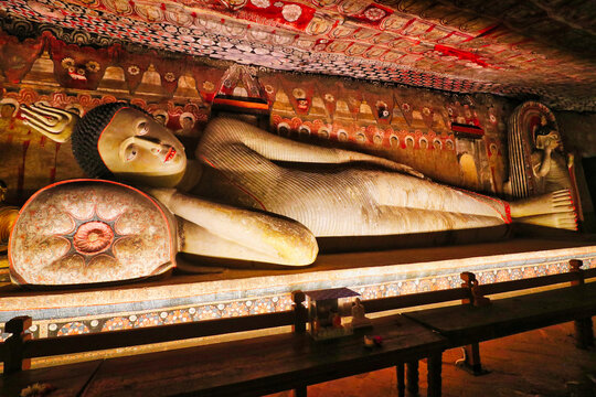 Serene Buddha statue in parinirvana or reclining posture in Cave of Great Kings,Maharaja Lena at Dambulla Cave temples built 1st centure BCE by King Valagamba and Lankan kings in Dambulla,Sri Lanka