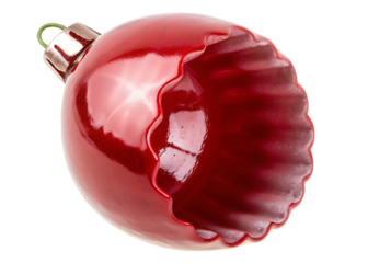 Shiny red Christmas ornament with scalloped edge isolated on a transparent background