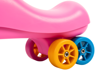Colorful plastic wheels on a pink ride-on toy for children on a transparent background