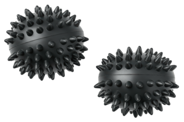 Two black spiky balls for trigger point massage therapy on a transparent background