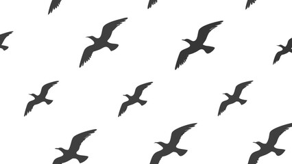 Seamless pattern of stylized dark gray flying bird silhouettes in various orientations