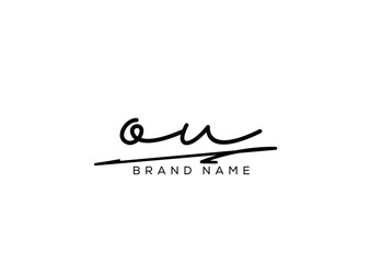 Obraz premium OU letter elegant cursive signature beauty handwriting logo.