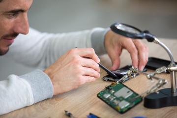 engineer makes dismantling of ram for disassembling
