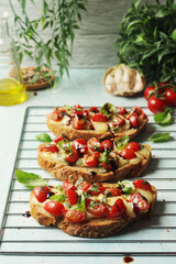 Freshly made bruschetta sandwiches - traditional dish of Italian cuisine