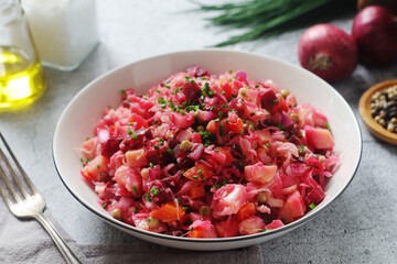 A bowl with Vinegret salad, a typical Russian dish