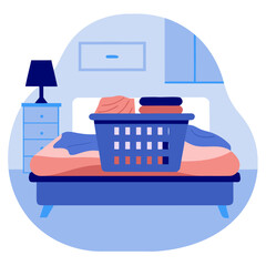 Basket of fresh laundry on bed in cozy bedroom interior  
