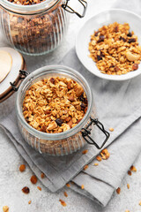Granola cereal in glass jar ready for healthy breakfast