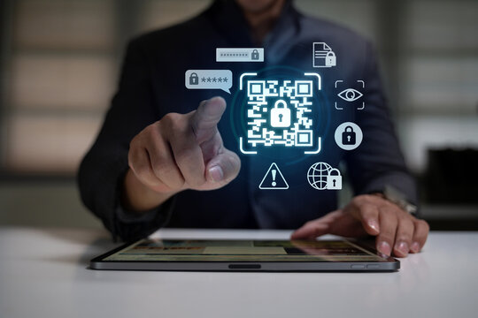 Digital security concept with hand pointing at glowing QR code icon surrounded by cyber protection symbols