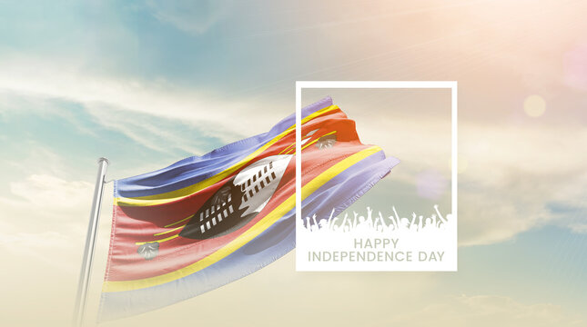 Eswatini flag waving proudly under a bright sky with text happy independence day. Eswatini national flag for independence day. - Powered by Adobe