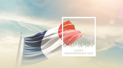 France flag waving proudly under a bright sky with text happy independence day. France national...