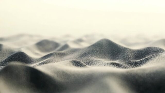 A sandy beach with a few small waves. The sand is very fine and the water is calm. A soft noise texture resembling the spread of dust