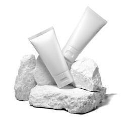 White plastic cream tube with stone for mockup isolated on white background. Selective Focus.