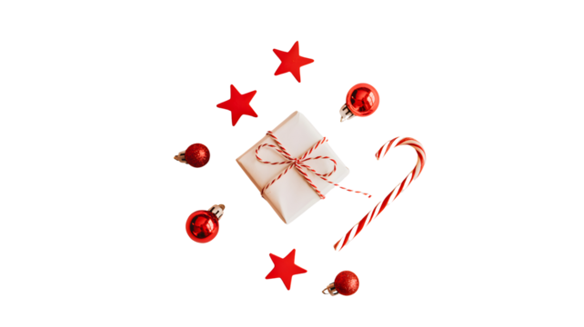 A festive christmas gift box surrounded by red ornaments and candy canes isolated on transparent background