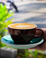 Cup of Latte Coffee with Leaf Latte Art