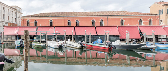 historical fish market on Vena canal, Chioggia, Italy