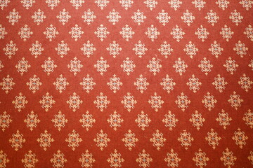 The tablecloth background has a beautiful red color.