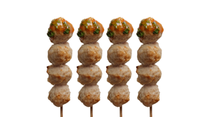 Grilled pork meatballs skewers with spicy sauce in white plate on white background.