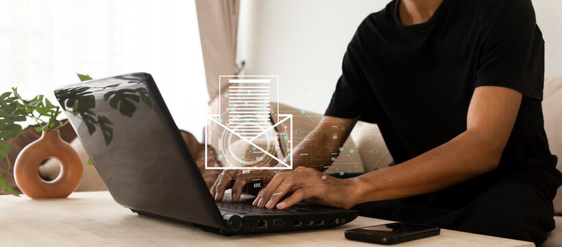 man hand work with laptop at home and  Email icon with digital network, connection and communication by email or message concept