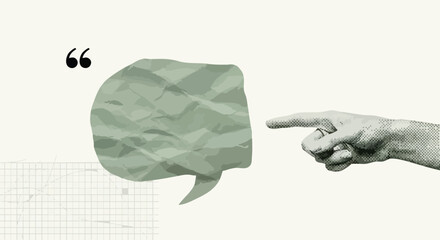 Conceptual image of a hand pointing to a crumpled paper speech bubble.
