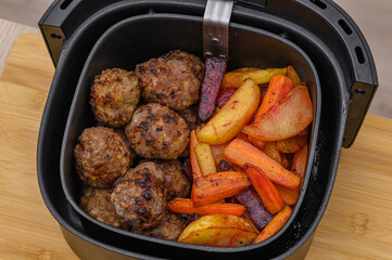 Minced meatballs with vegetables baked without fat in an air fryer