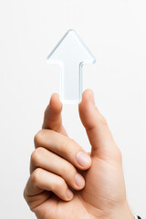 Naklejka premium Upward Arrow in Hand on White