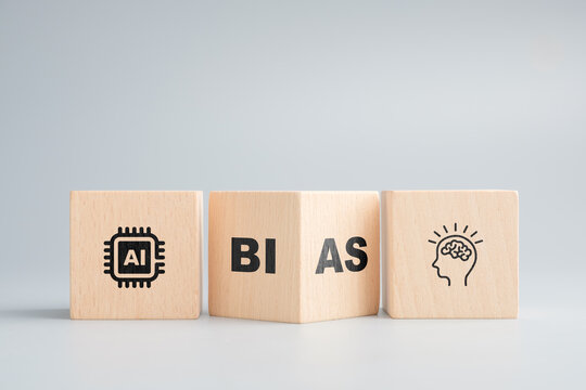 Artificial intelligence and bias in decision-making represented by AI chip, bias text, and human head icon on wooden blocks in a row