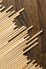 Thin round bamboo sticks are used as supports for indoor or other agricultural plants , thin long sticks made of bamboo have a wide range of applications from cooking