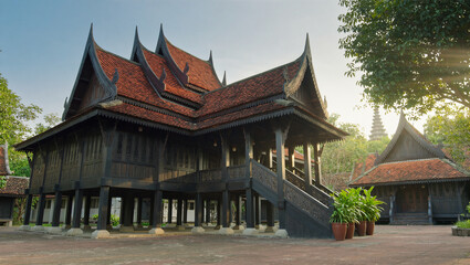 AI Generated: Traditional Malay Wooden House
A hyper-realistic cinematic wide shot of a majestic traditional Malay wooden stilt house with multiple gabled roofs. The house stands elevated on tall stil