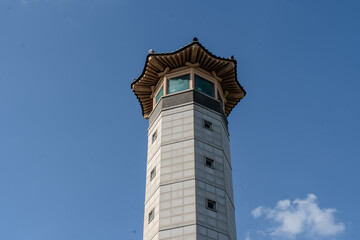 Cityscape and natural view from an observation facility, offering a wide perspective from a high vantage point.