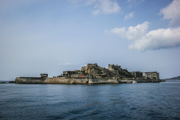 Fototapeta premium its silhouette evokes a battleship Gunkanjima 2012