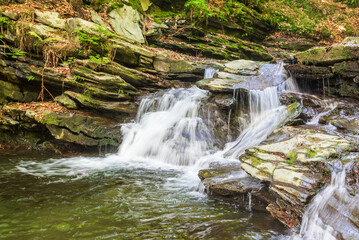 Small waterfall on Skalni potok river in Jeseniky mountains in Czech republic