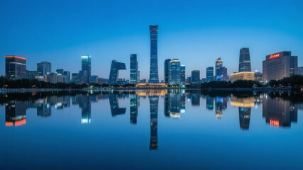 Fototapeta premium CBD City Skyline Nightscape with Reflections, Business and Finance Background