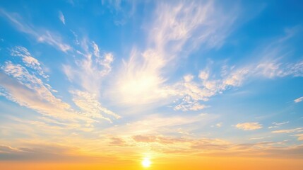 Fototapeta premium Sunset or sunrise sky background with thick, fluffy clouds in varying shades of blue, gray and white