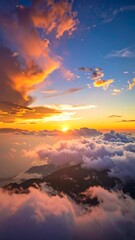 Obraz premium Sunrise over mountain clouds (1)