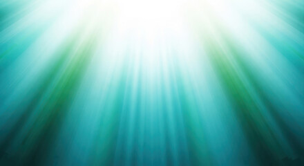 Abstract light rays shining down through turquoise and green water