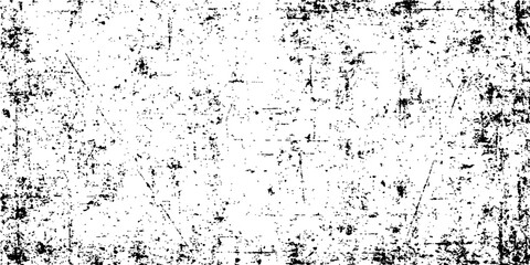 Dirty black grunge texture with abstract ink splashes and paint splatters on a wall surface