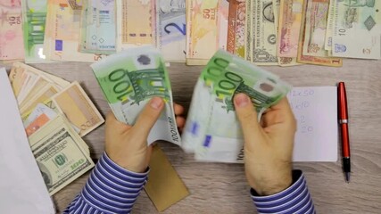 Successful transaction, capital investment. closeup of businessman hands counting euro money banknotes. Unrecognizable businessman counts euro money. A man in suit holding and counting Euros, close up - Powered by Adobe