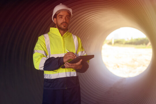 Male engineers are checking the integrity and safety of the pipeline