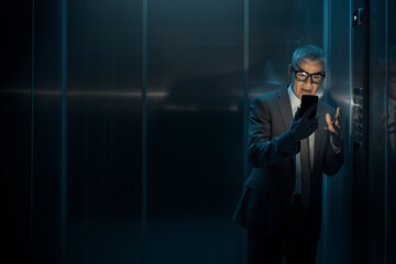 Angry scared businessman stuck in the elevator © StockPhotoPro